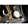 Lockdown In-Plain-Sight Walnut Wood Shelf Hidden Gun Rack with gold handheld watch